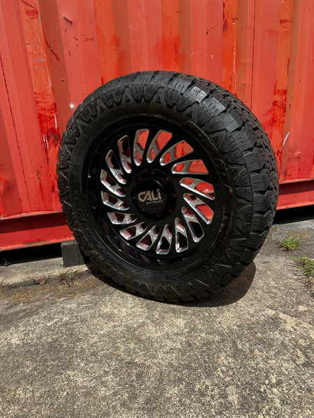 20x9 8x6.5 Cali Offroad Switchback (00) wheels and 33x12.50 Amp Attack A/T Pro tires