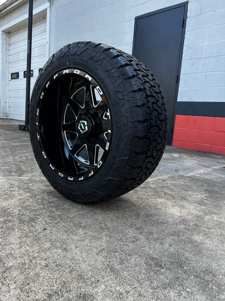 20x12 8x170 TIS 551BM wheels and 33x12.50 Amp Attack A/T Pro tires