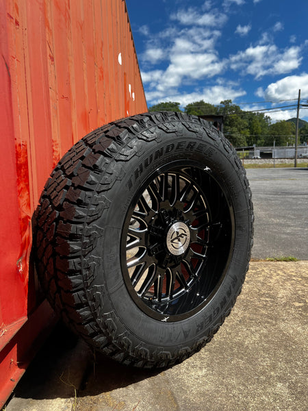 20x10 8x6.5 & 8x170 XF Off-Road XF-240 Gloss Black & Milled wheels and 35x12.50 Thunderer ATR tires