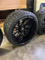 24x14 6x5.5 & 6x135 American Truxx Destiny Milled wheels and 33x14.50 Haida RT tires