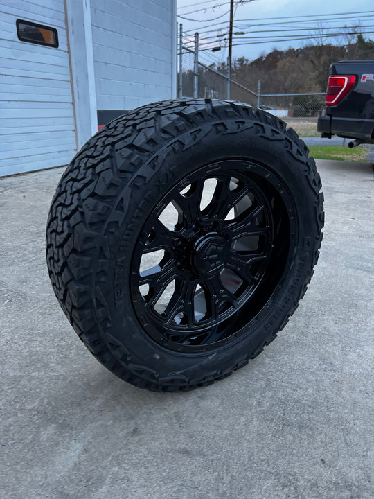 20x10 8x6.5 TIS 560B Gloss wheels and 33x12.50 Venom XT tires