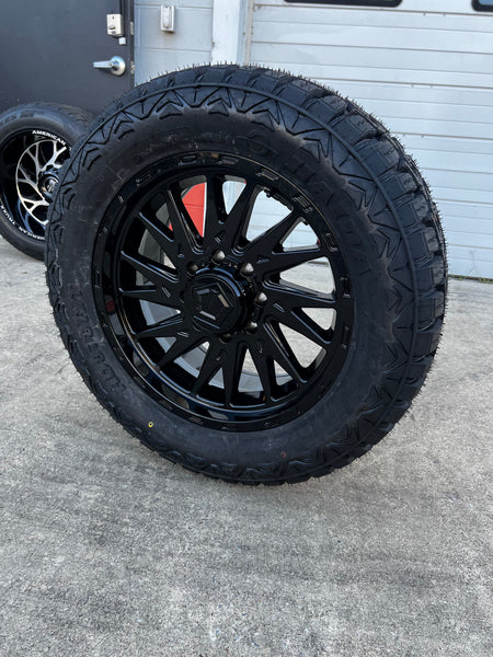 20x9 8x6.5 TIS 547B Gloss (00) Offset wheels and 33x12.50 Haida RT tires