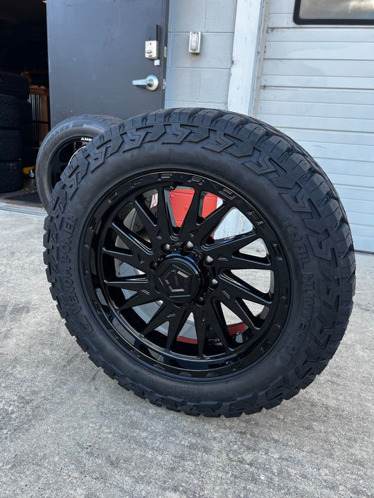 20x9 8x6.5 TIS 547B Gloss (00) Offset wheels and 285/55 Venom Trail Hunter RT tires